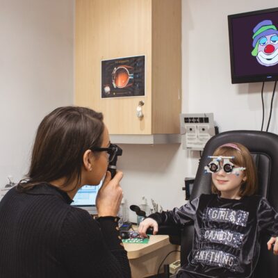 child receives an eye exam