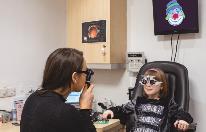 child receives an eye exam